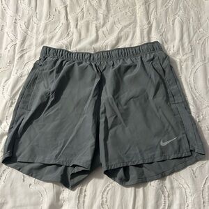 Nike Men’s medium running shorts *HAS NOT BEEN USED*